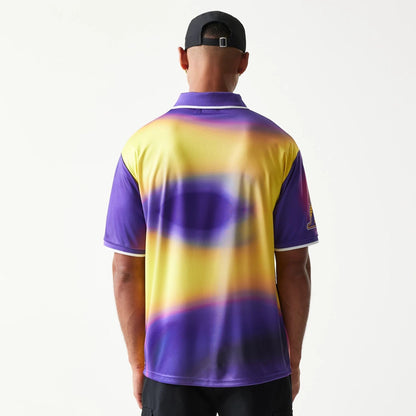The model is wearing this NBA All Over Print LA Lakers T-Shirt in purple. 2