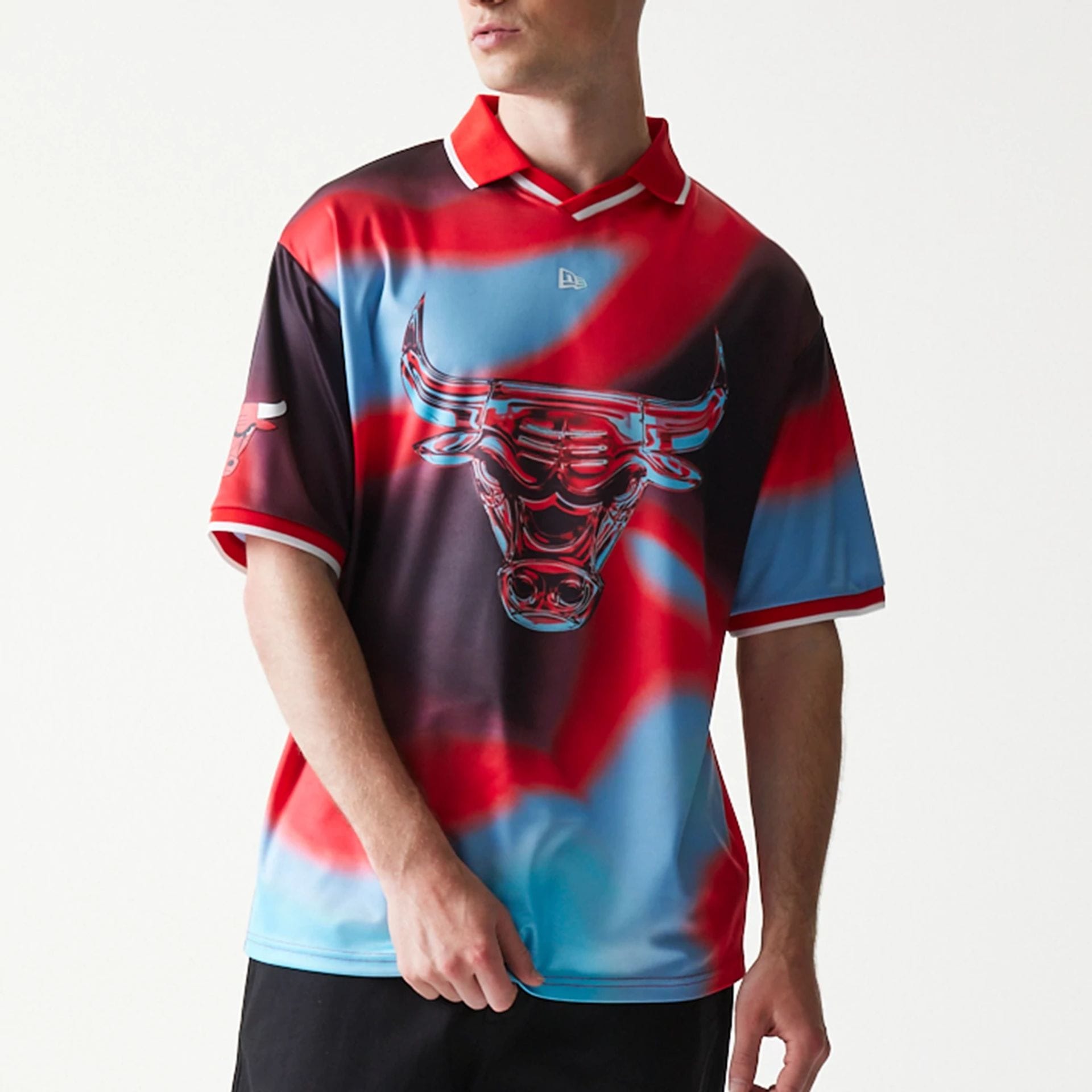 The model is wearing this NBA All Over Print Chicago Bulls T-Shirt in red. 3