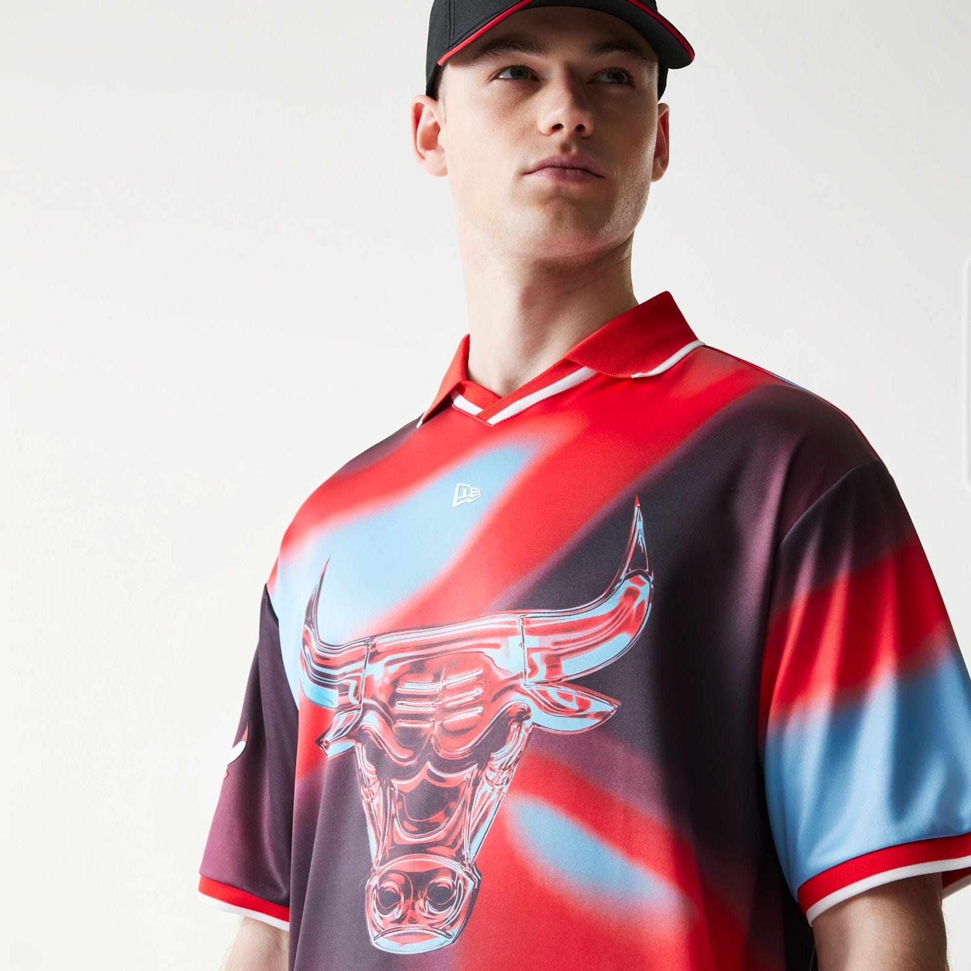 The model is wearing this NBA All Over Print Chicago Bulls T-Shirt in red. 4