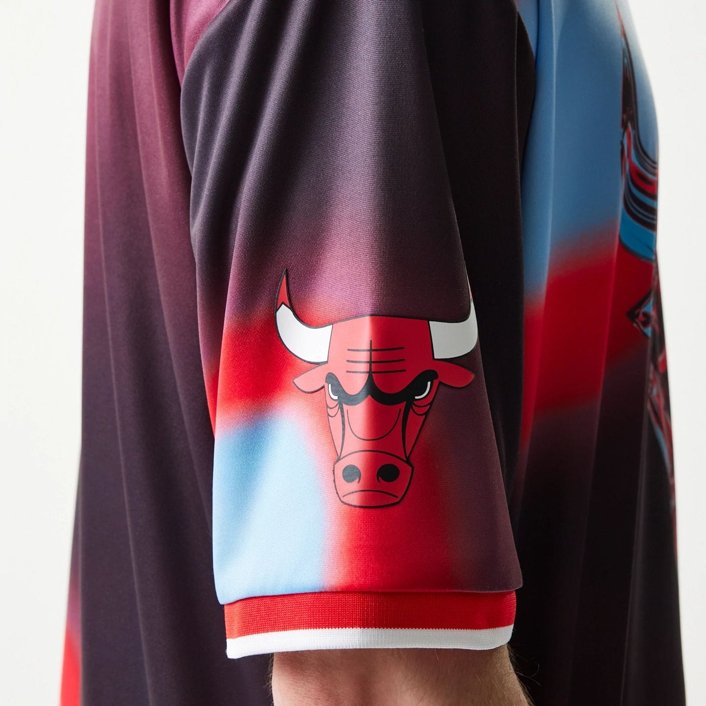 The model is wearing this NBA All Over Print Chicago Bulls T-Shirt in red. 6
