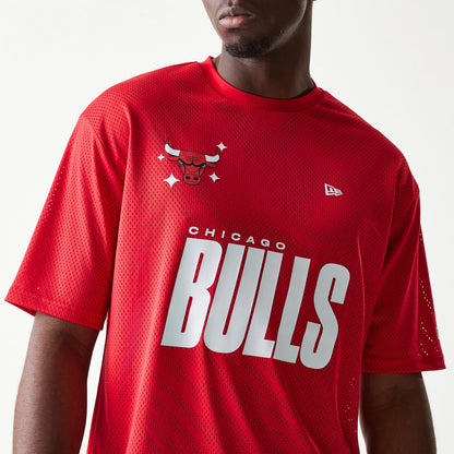 The model is wearing this NBA Graphic Mesh Chicago Bulls T-Shirt in red. 4