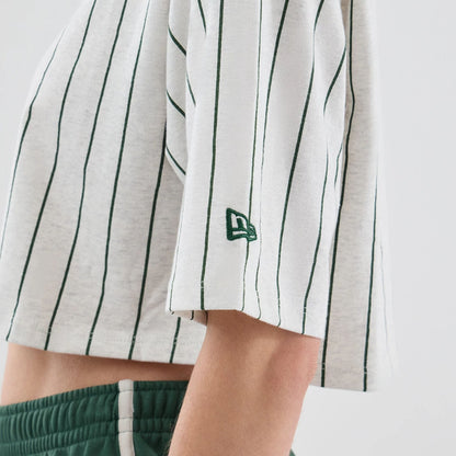 The model is wearing this Womens New Era Pinstripe Cropped T-shirt in pastel grey. 5