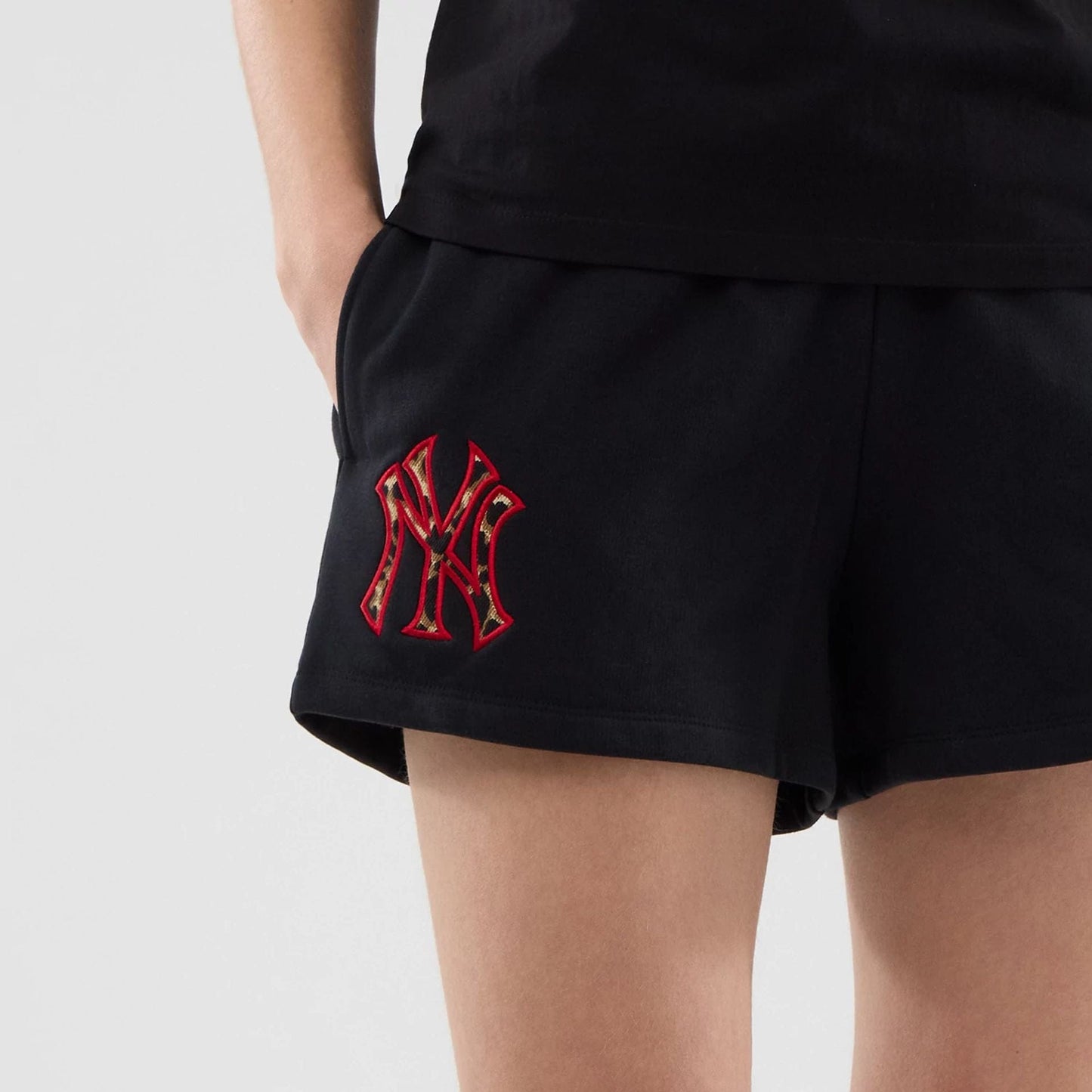 The model is wearing this Womens MLB Infill New York Yankees Shorts in black. 6