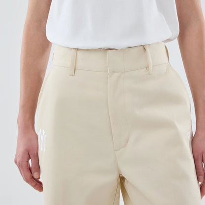 The model is wearing this Womens MLB New York Yankees Chino Trousers in cream. 6