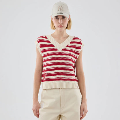 The model is wearing this Womens MLB Knit Stripe New York Yankees Sleeveless  V-neck Sweater in dark red. 1
