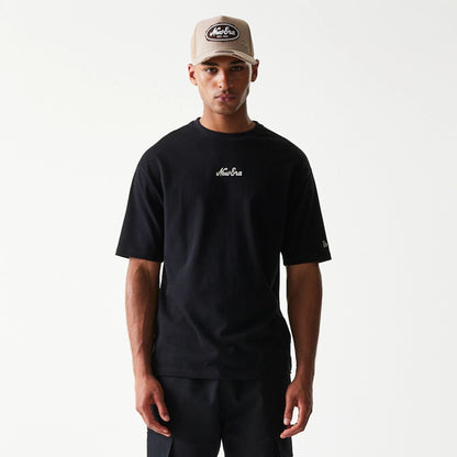 The model is wearing this New Era Script T-Shirt in black. 3