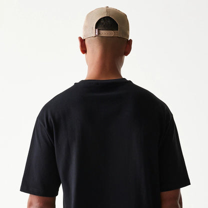 The model is wearing this New Era Script T-Shirt in black. 7