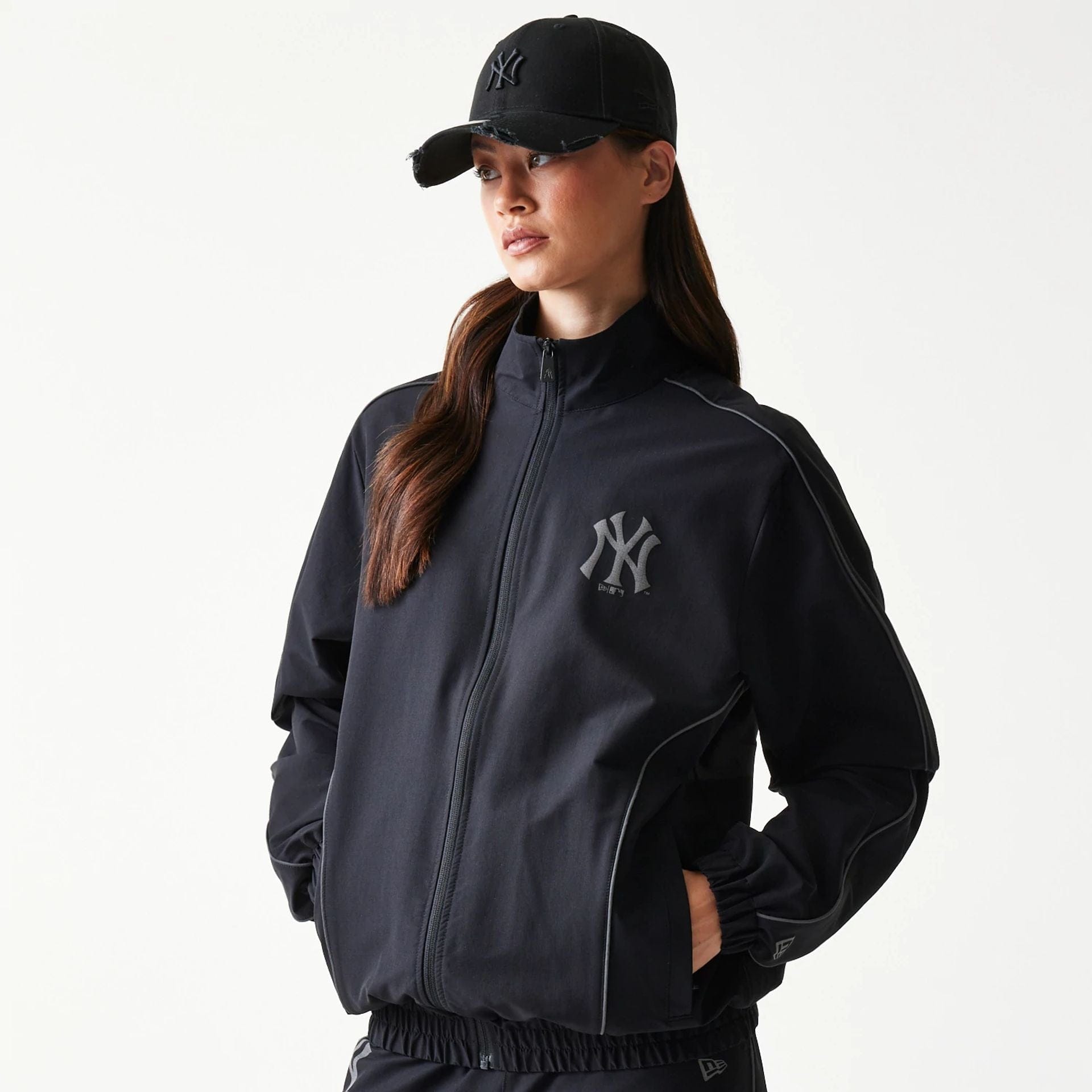 The model is wearing this MLB New York Yankees Jacket in black. 4