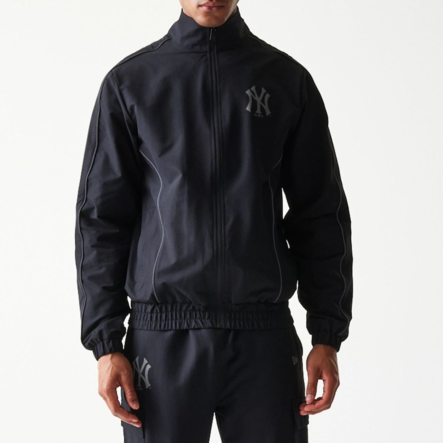 The model is wearing this MLB New York Yankees Jacket in black. 5