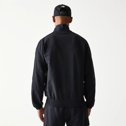 The model is wearing this MLB New York Yankees Jacket in black. 2