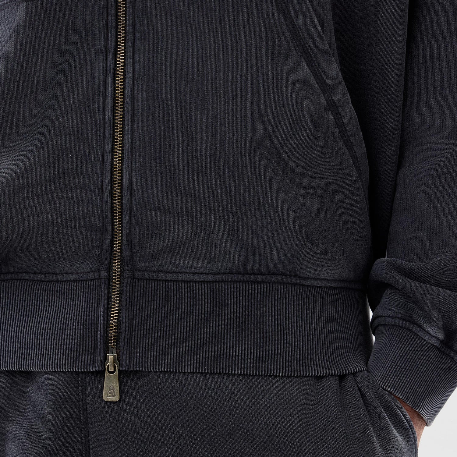The model is wearing this MLB Washed New York Yankees Full Zip Hoodie in black. 5