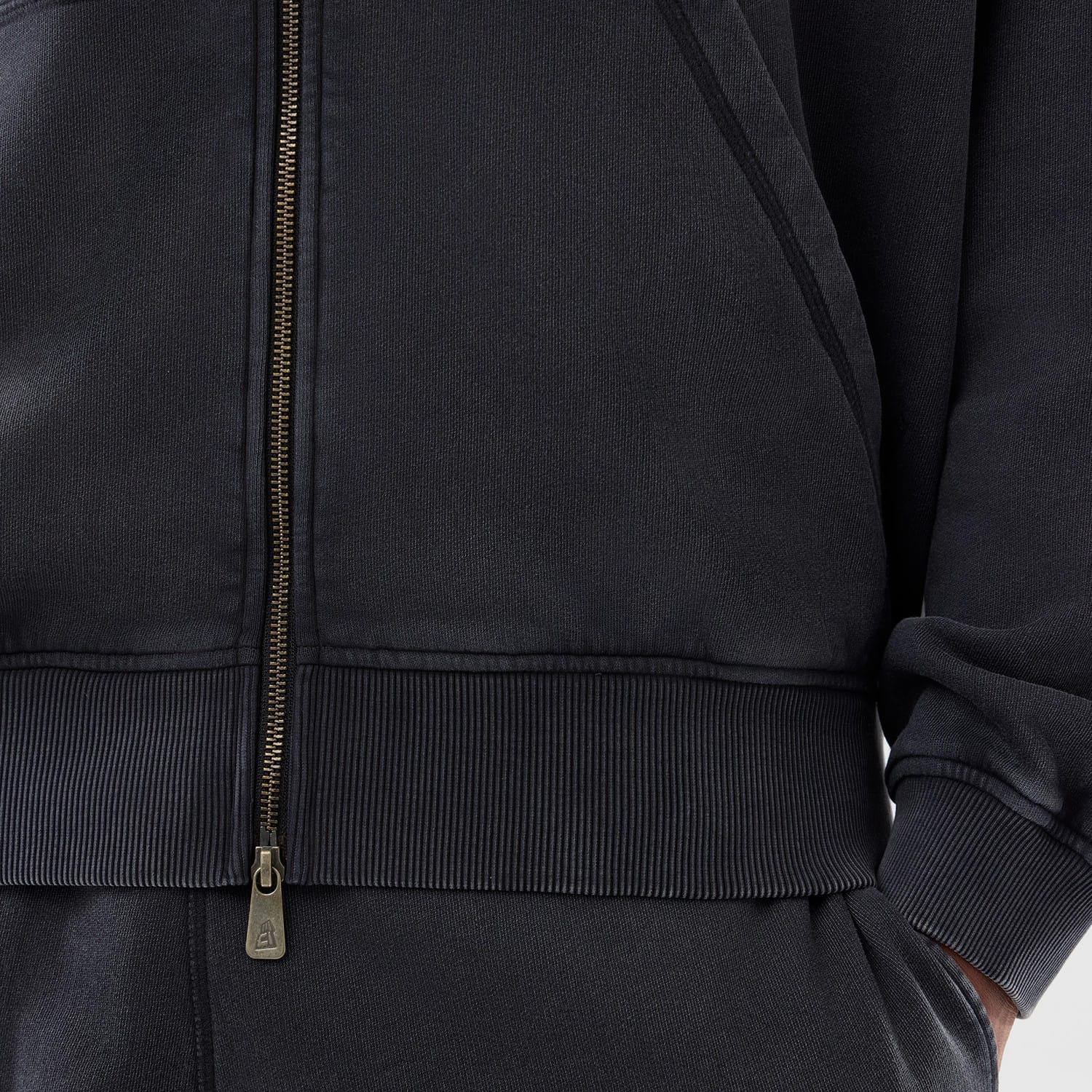 The model is wearing this MLB Washed New York Yankees Full Zip Hoodie in black. 5