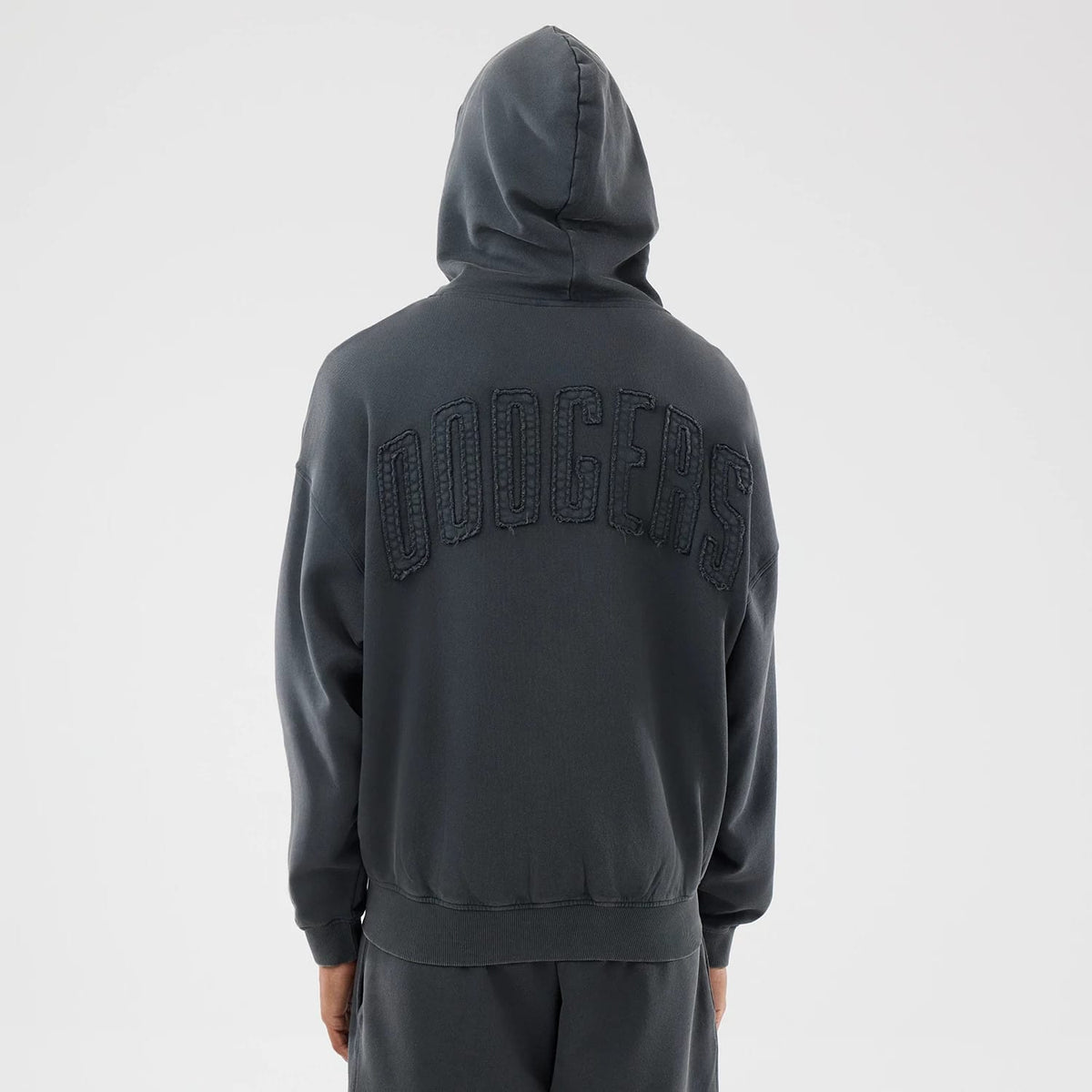 The model is wearing this MLB Washed LA Dodgers Full Zip Hoodie in Dark Grey. 2