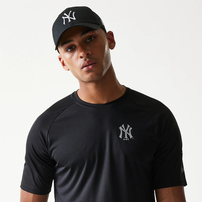 The model is wearing this MLB New York Yankees Reflective T-Shirt in black. 6