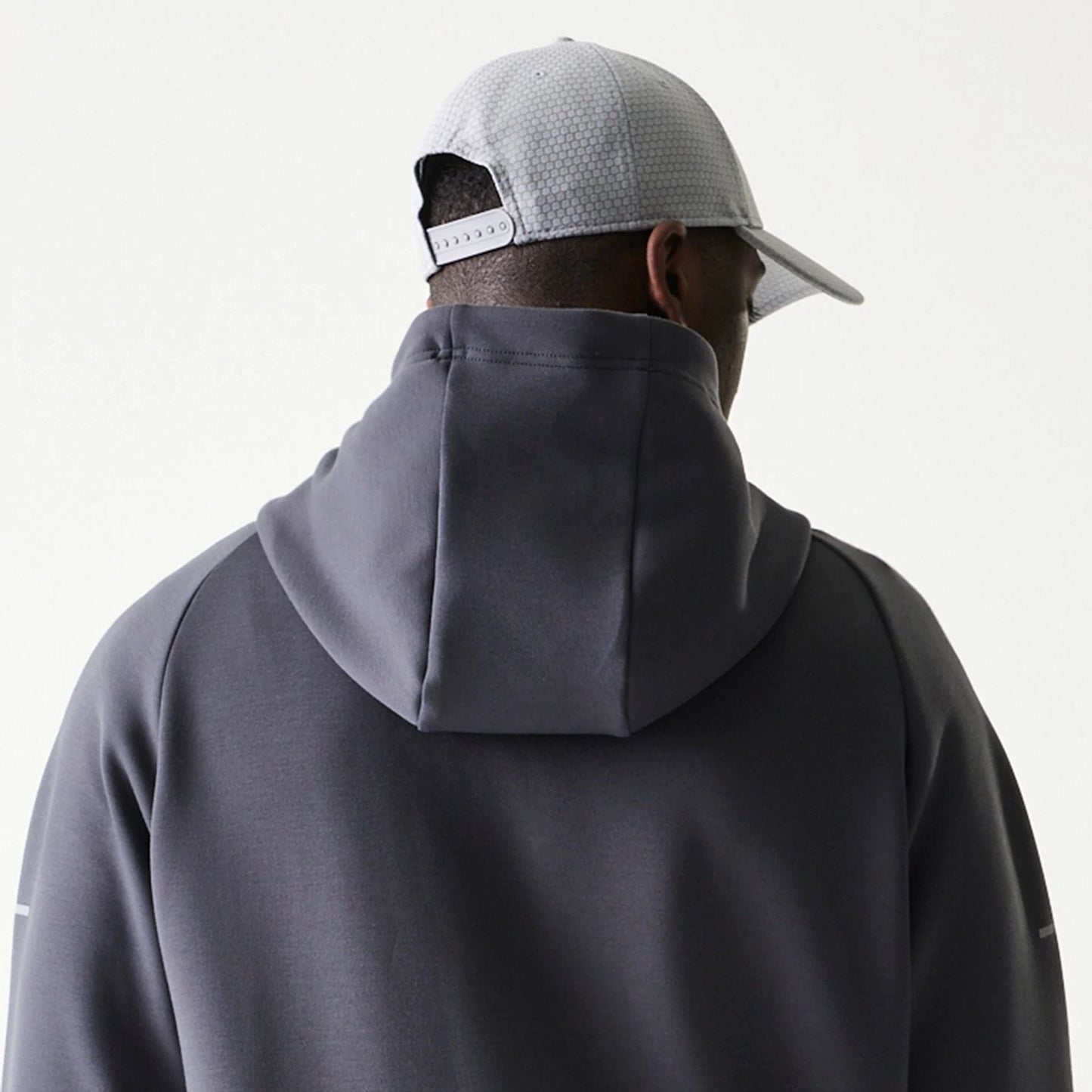 The model is wearing this MLB New York Yankees Full Zip Hoodie in dark grey. 7