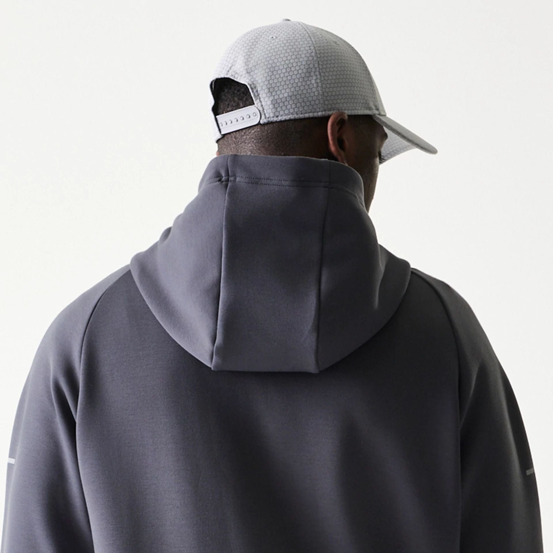 The model is wearing this MLB New York Yankees Full Zip Hoodie in dark grey. 7