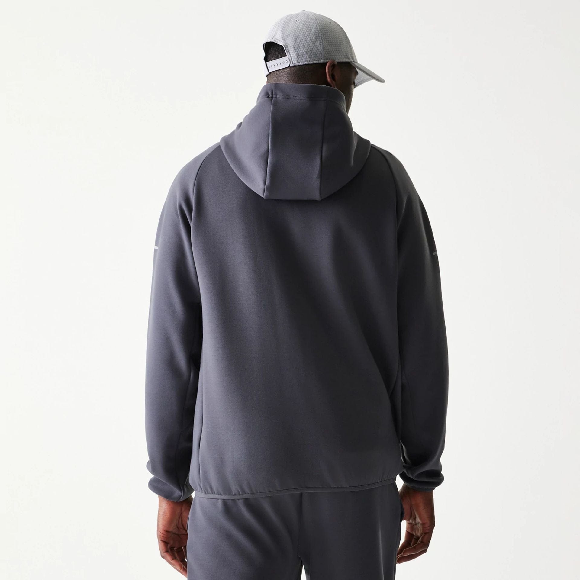 The model is wearing this MLB New York Yankees Full Zip Hoodie in dark grey. 2