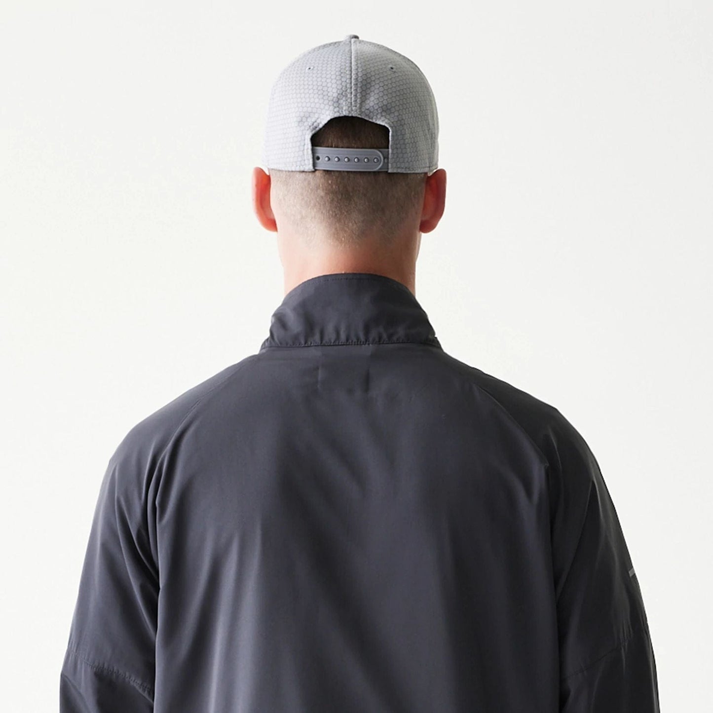 The model is wearing this MLB New York Yankees Jacket in dark grey. 7