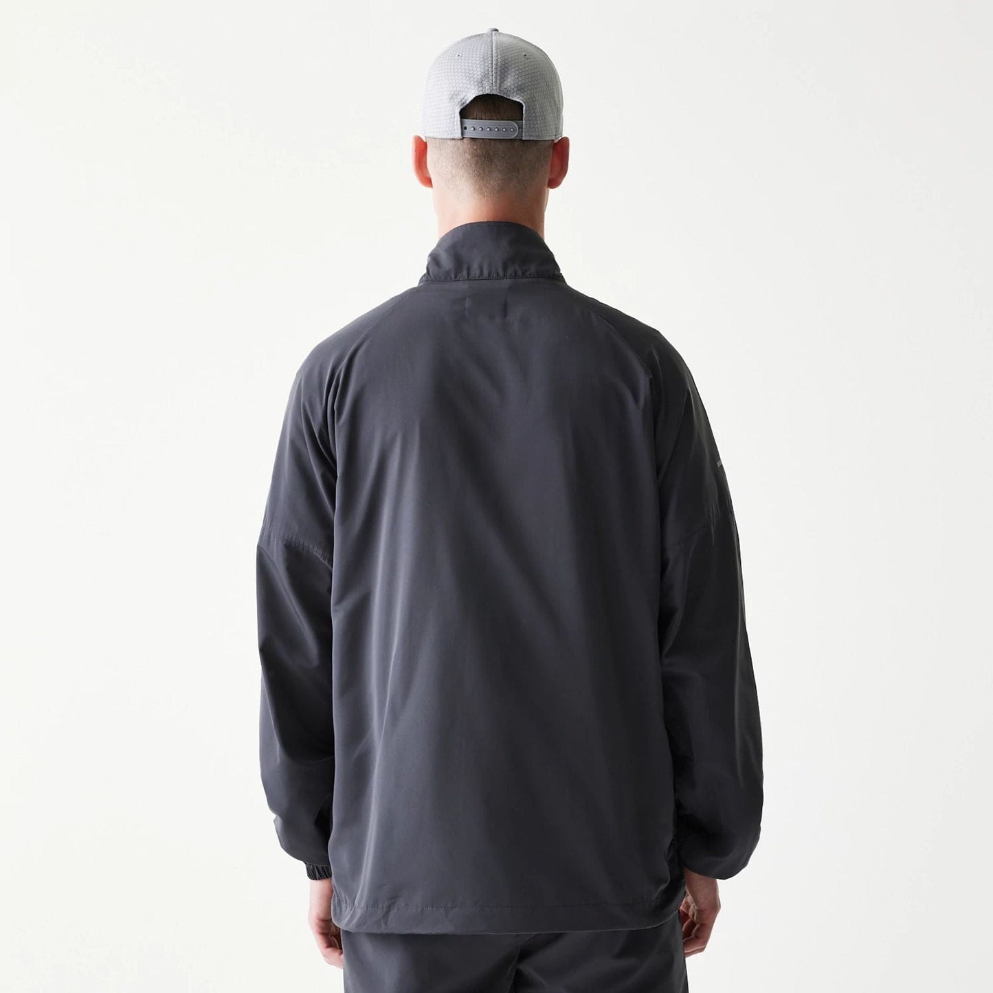 The model is wearing this MLB New York Yankees Jacket in dark grey. 2