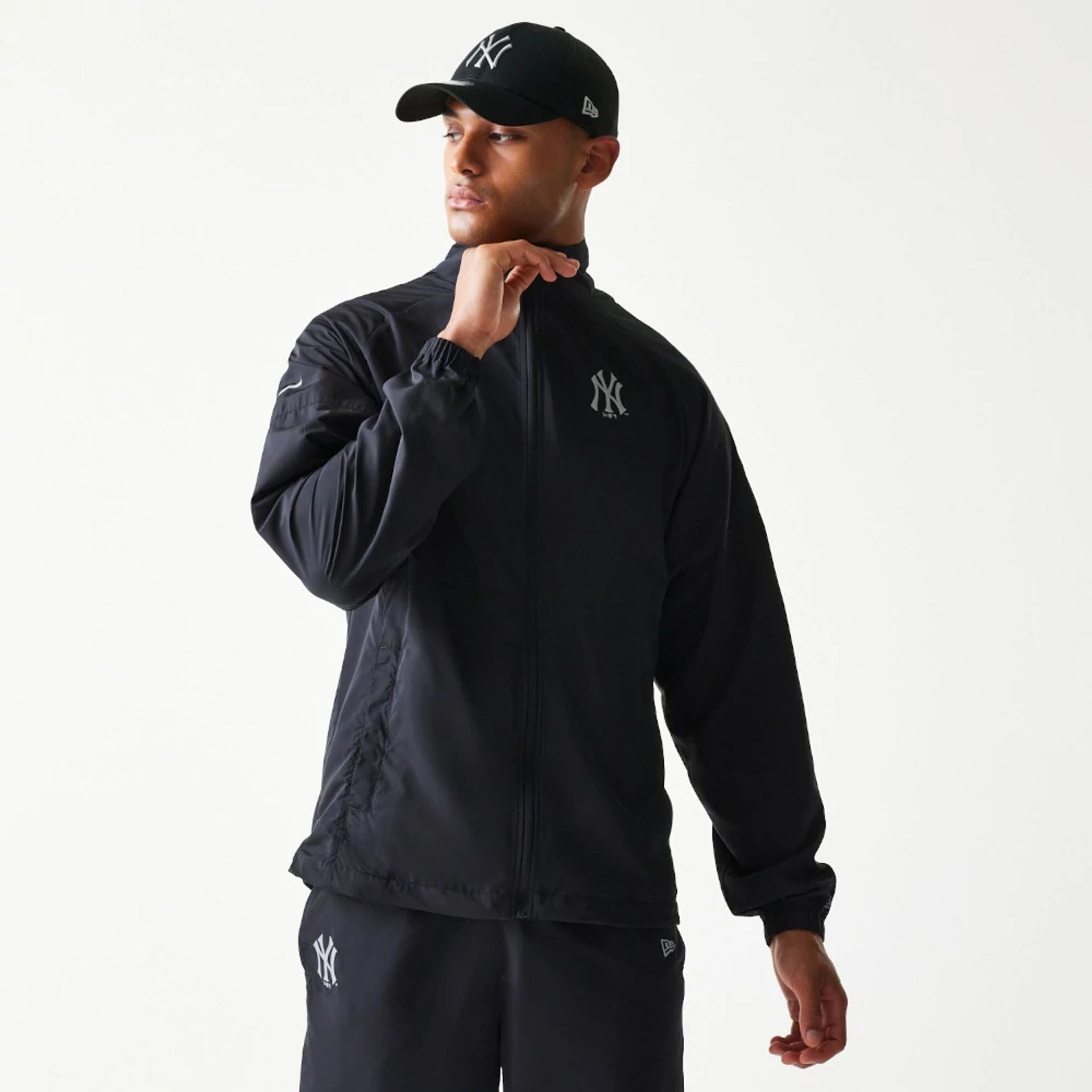 The model is wearing this MLB New York Yankees Jacket in black. 1
