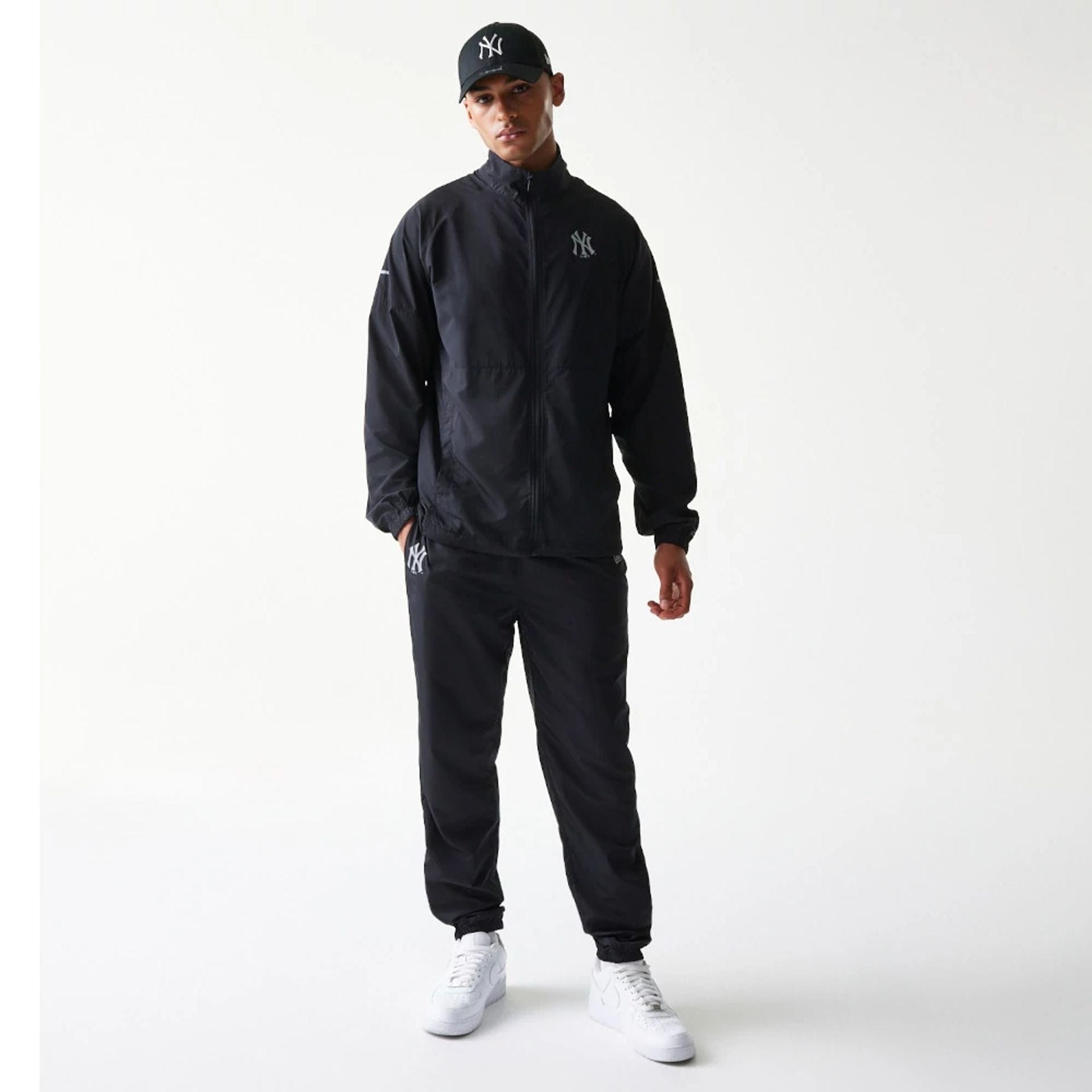 The model is wearing this MLB New York Yankees Jacket in black. 8