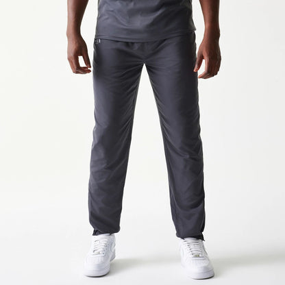 The model is wearing this MLB New York Yankees Track Pants in dark grey. 1