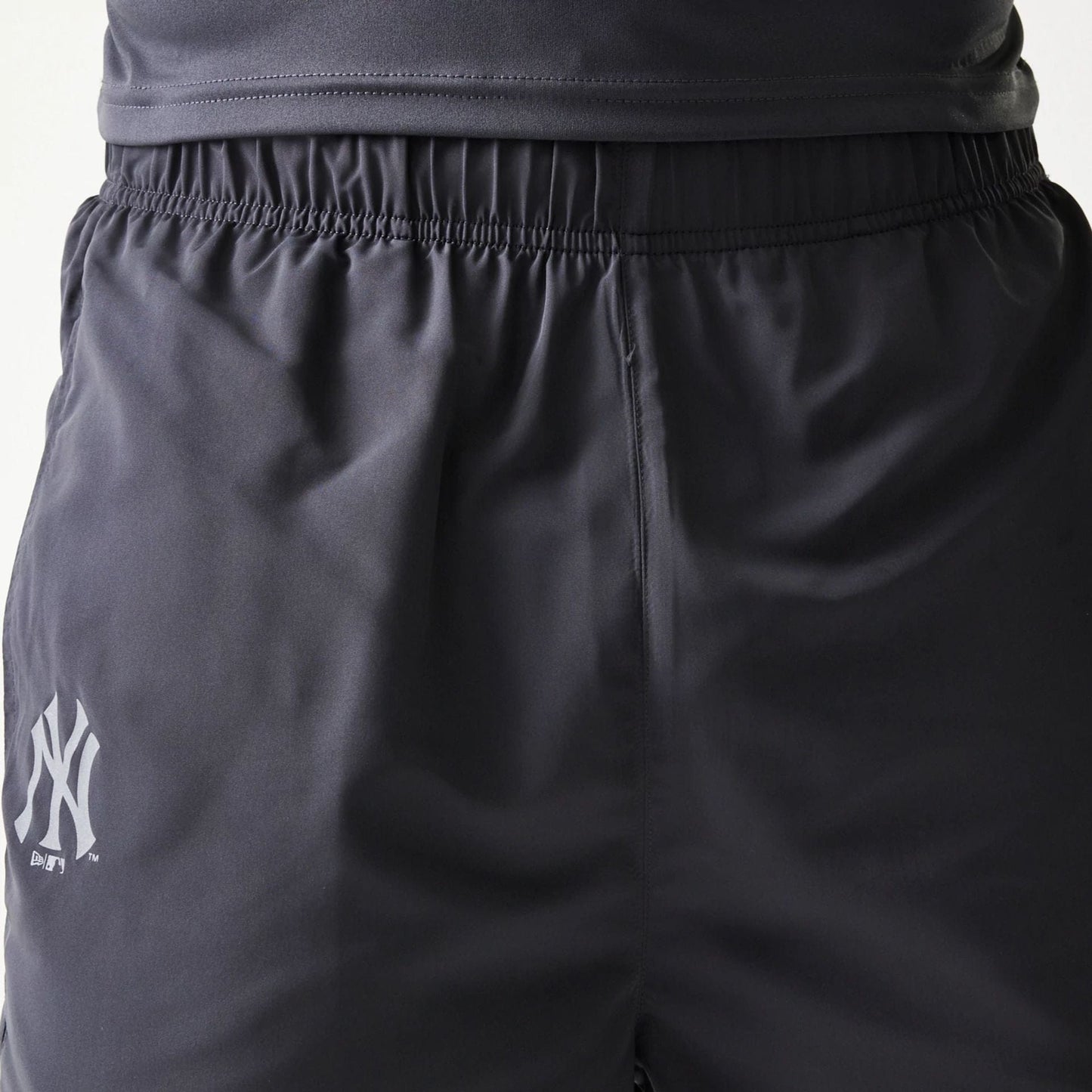 The model is wearing this MLB New York Yankees Track Pants in dark grey. 6