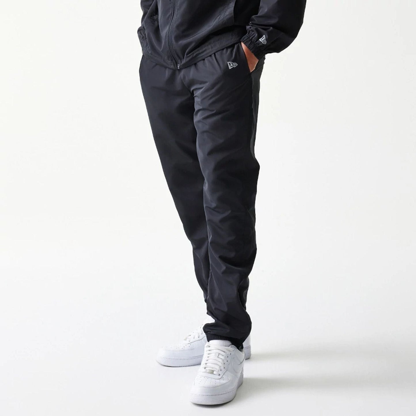The model is wearing this MLB New York Yankees Track Pants in black. 7