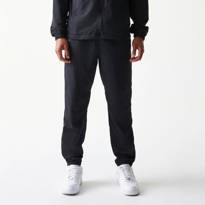The model is wearing this MLB New York Yankees Track Pants in black. 1