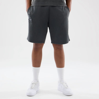 The model is wearing this MLB Washed LA Dodgers Shorts in Dark Grey. 1