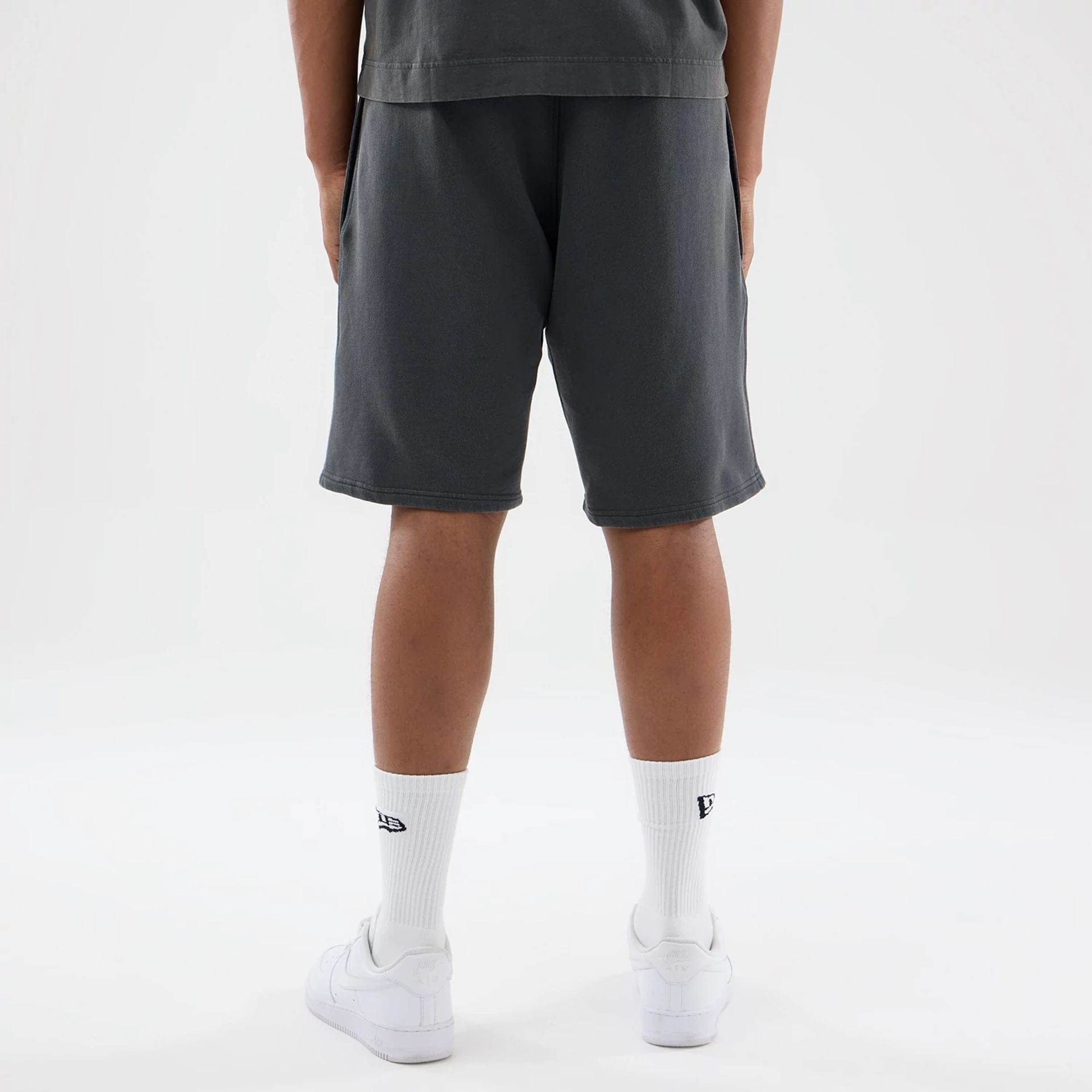 The model is wearing this MLB Washed LA Dodgers Shorts in Dark Grey. 2