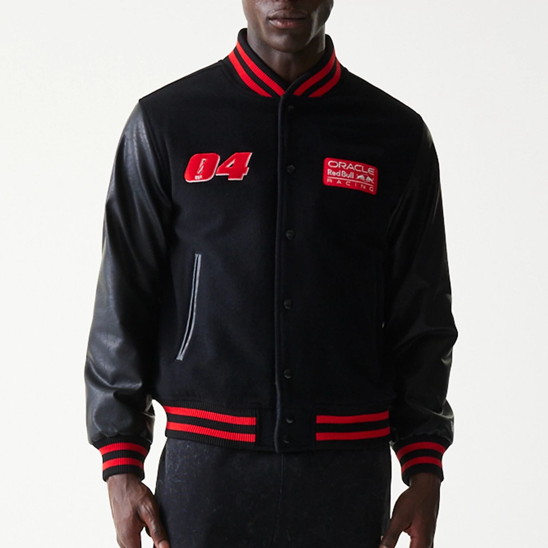 The model is wearing this Red Bull Racing Varsity Jacket in black. 3