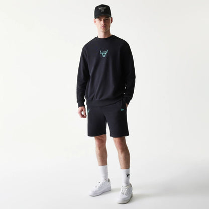 The model is wearing this NBA League Essential Chicago Bulls Shorts in black. 8