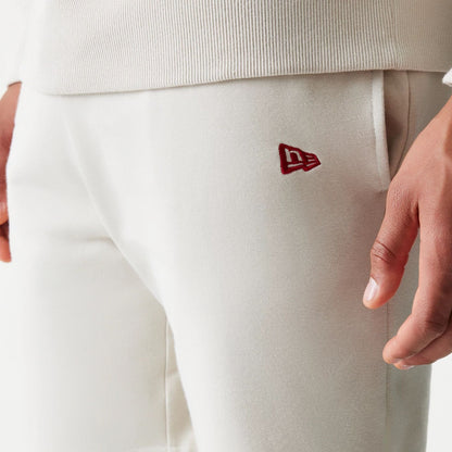 The model is wearing this NBA League Essential LA Lakers Shorts in light beige. 4