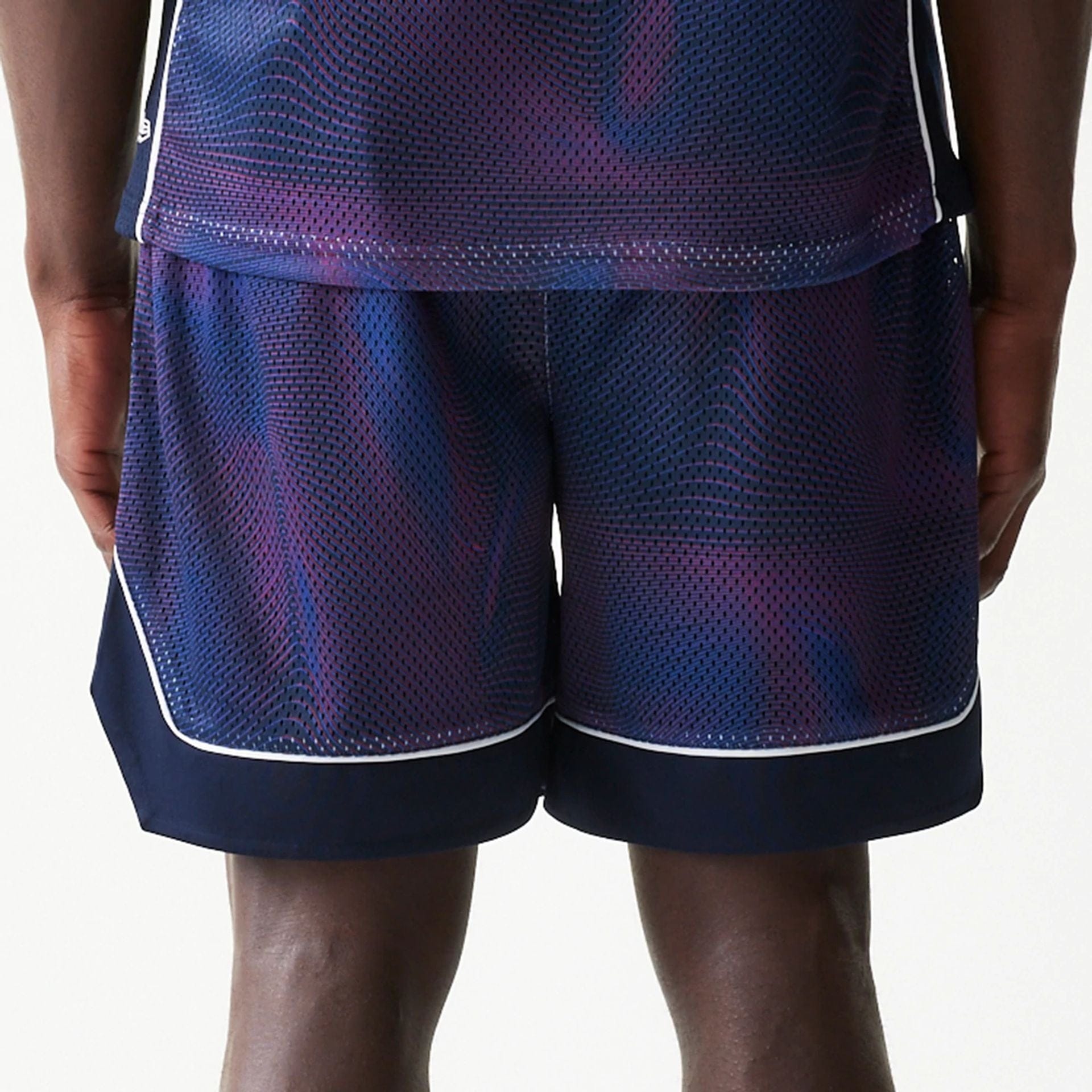 The model is wearing this Red Bull Racing Oversized Mesh Shorts in dark blue. 6