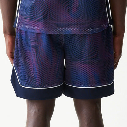 The model is wearing this Red Bull Racing Oversized Mesh Shorts in dark blue. 6