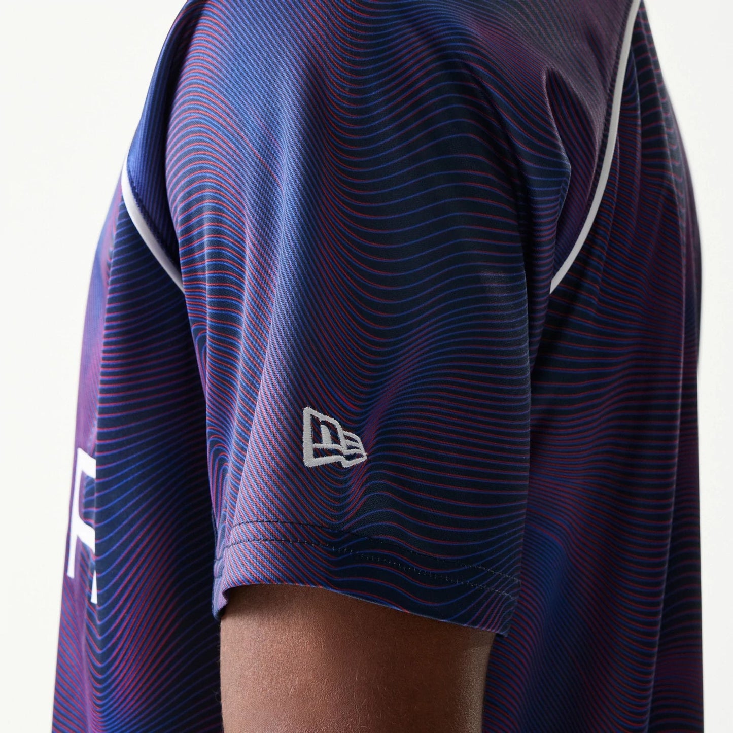 The model is wearing this Red Bull Racing All Over Print Football T-Shirt in dark blue. 6