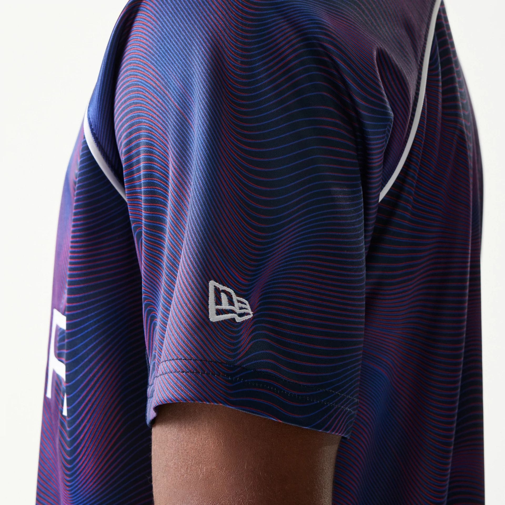 The model is wearing this Red Bull Racing All Over Print Football T-Shirt in dark blue. 6