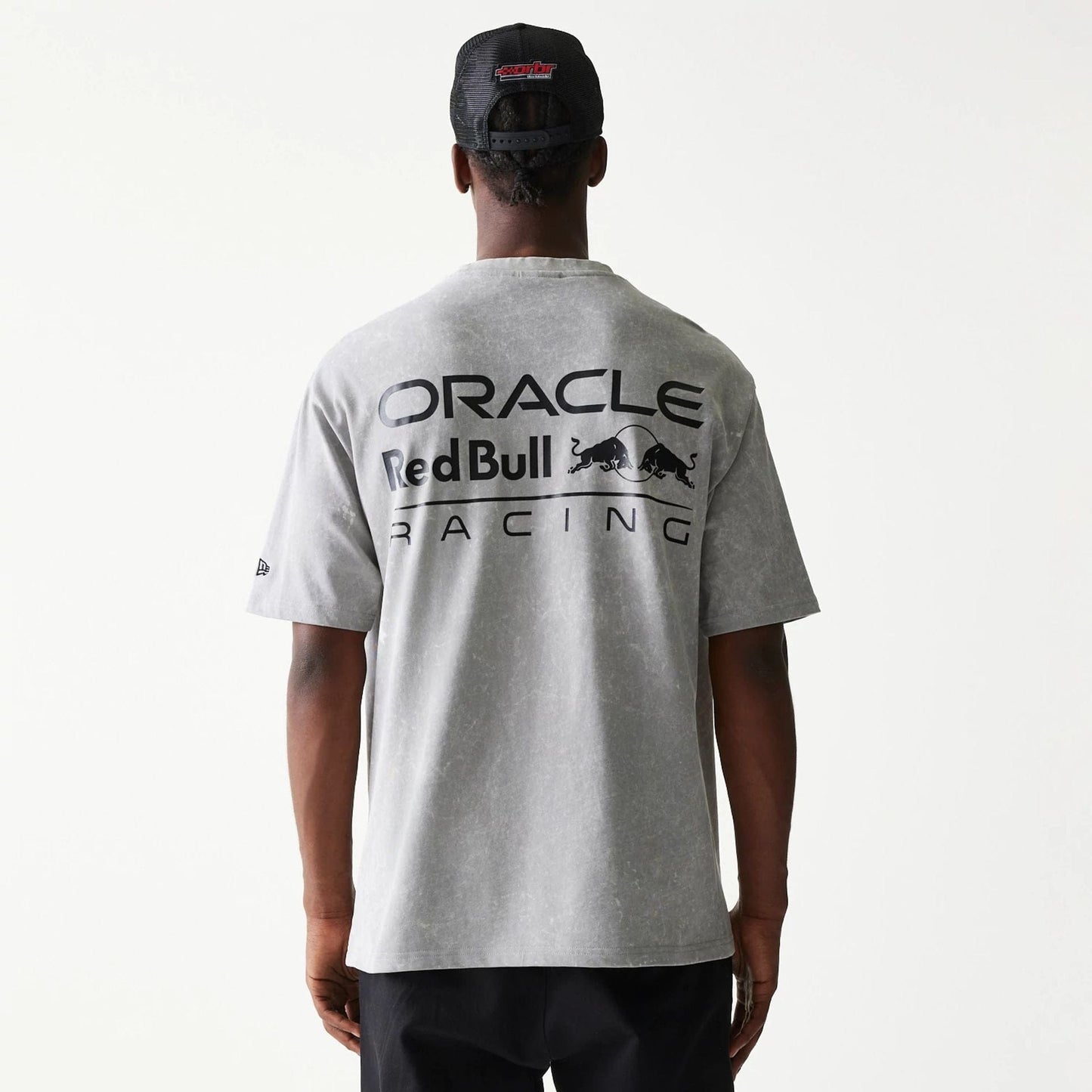 The model is wearing this Red Bull Racing Linear Graphic Oversized T-Shirt in grey. 2