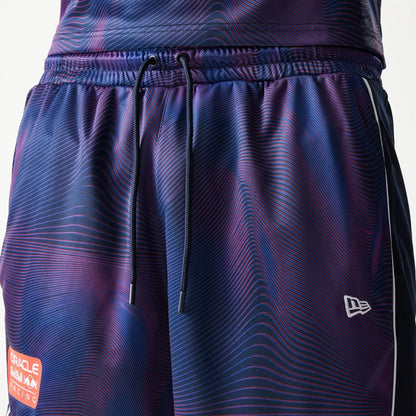 The model is wearing this Red Bull Racing All Over Print Football Shorts in dark blue. 5