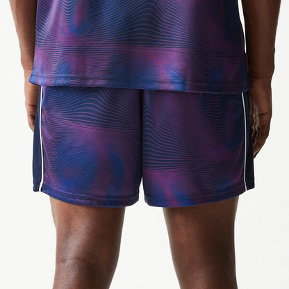 The model is wearing this Red Bull Racing All Over Print Football Shorts in dark blue. 6