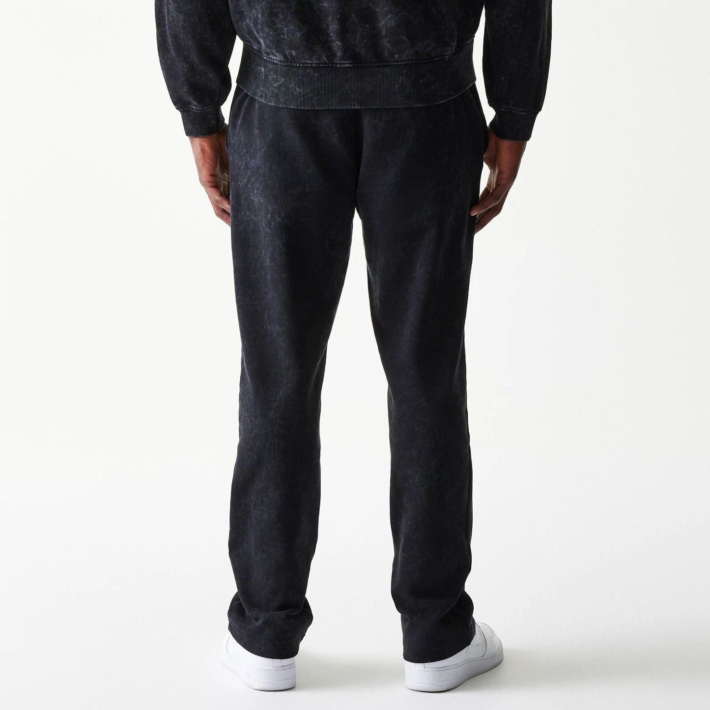 The model is wearing this Red Bull Racing Straight Leg Joggers in black. 2