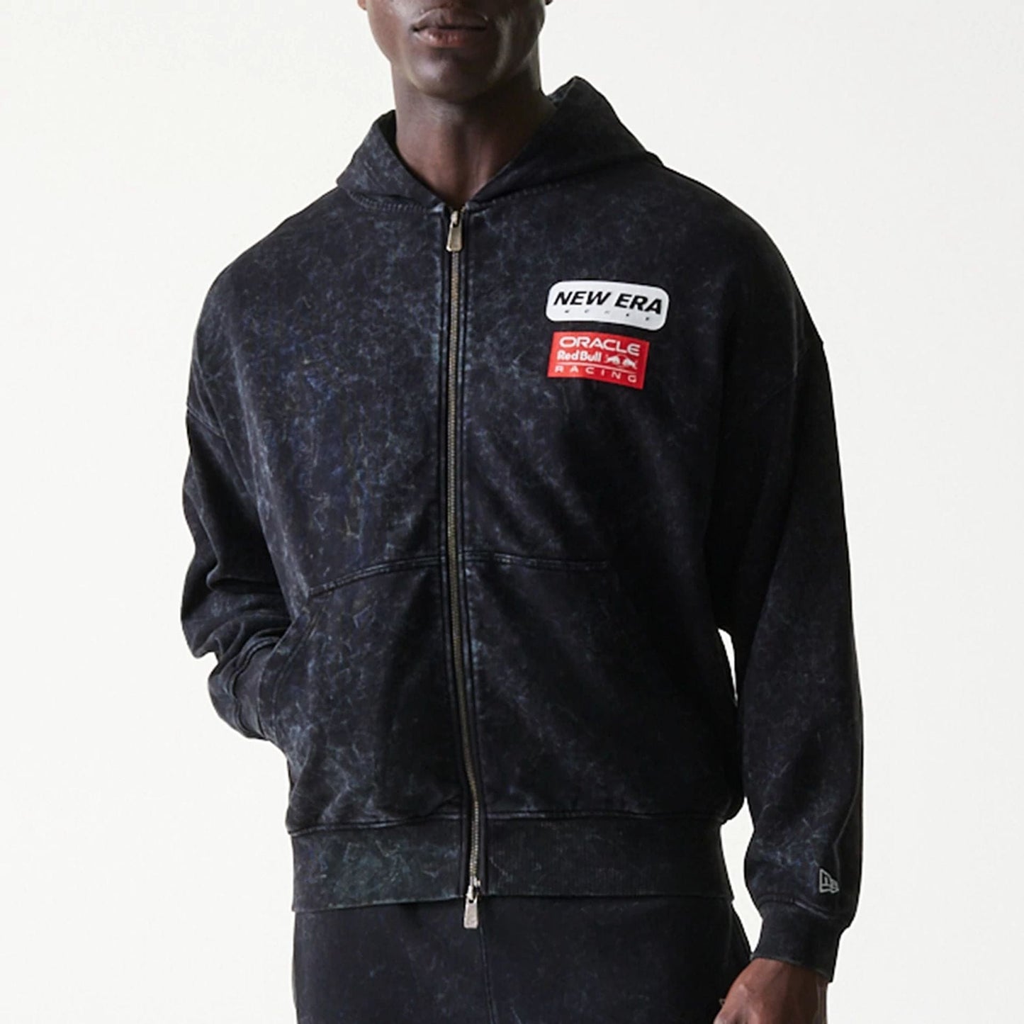 The model is wearing this Red Bull Racing Dropped Shoulder Full Zip Hoodie in black. 3