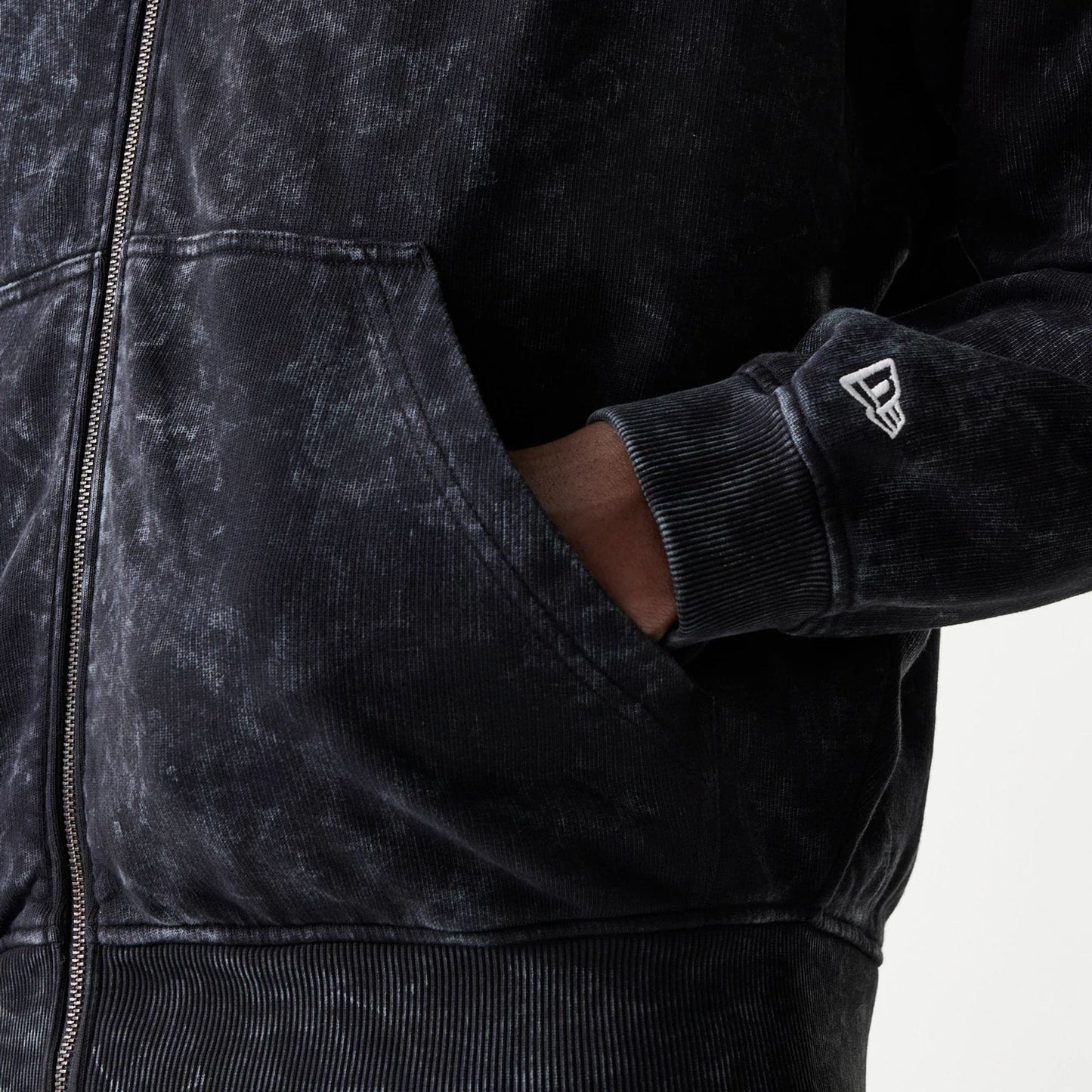 The model is wearing this Red Bull Racing Dropped Shoulder Full Zip Hoodie in black. 5