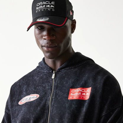 The model is wearing this Red Bull Racing Graphic Dropped Shoulder Full Zip Hoodie in black. 7