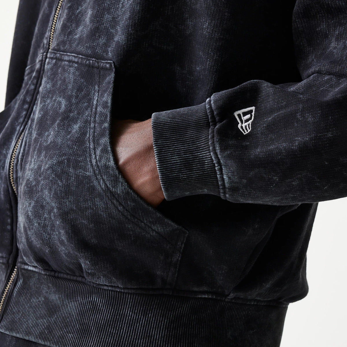 The model is wearing this Red Bull Racing Graphic Dropped Shoulder Full Zip Hoodie in black. 8