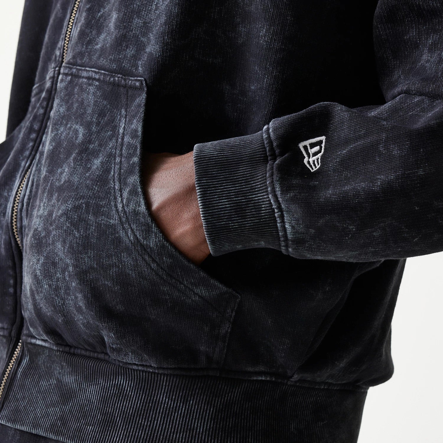 The model is wearing this Red Bull Racing Graphic Dropped Shoulder Full Zip Hoodie in black. 8