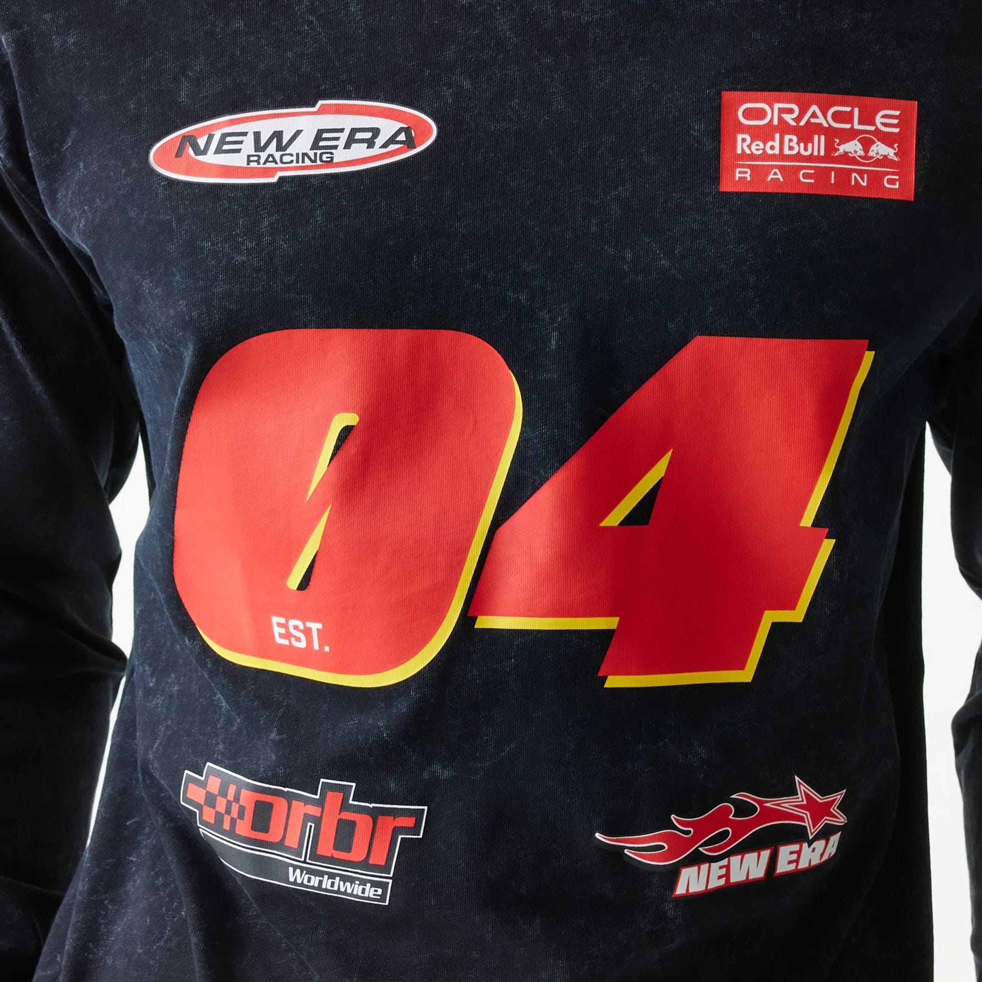 The model is wearing this Red Bull Racing Graphic Long Sleeve T-Shirt in black. 4