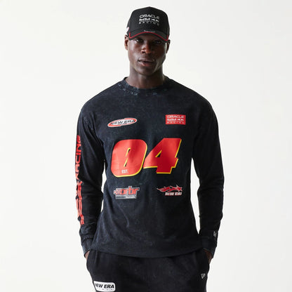 The model is wearing this Red Bull Racing Graphic Long Sleeve T-Shirt in black. 1