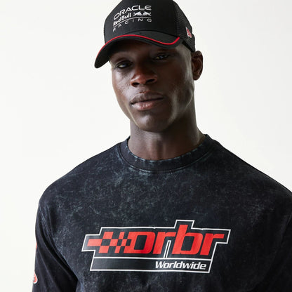 The model is wearing this Red Bull Racing Graphic Oversized T-Shirt in black. 4